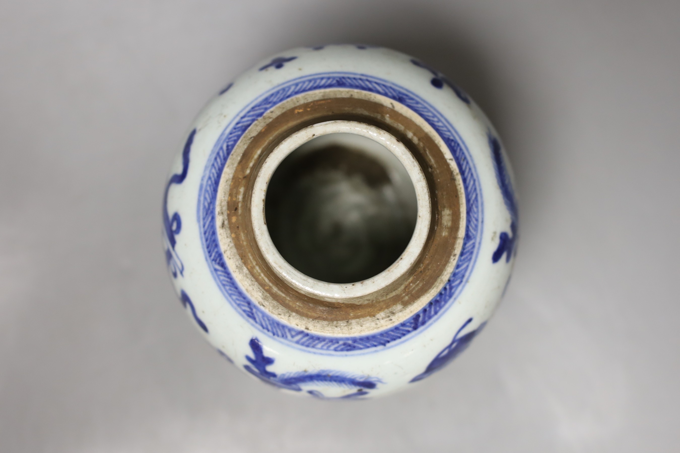 A 19th century Chinese blue and white jar with wood cover - 17cm high